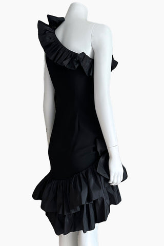 Angled back view of Yves Saint Laurent Rive Gauche Fall 1982 black one-shoulder cocktail dress