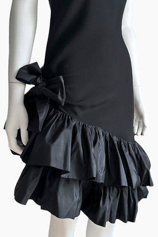 Close-up of Yves Saint Laurent Rive Gauche Fall 1982 hip bow and double ruffled asymmetrical hem detail